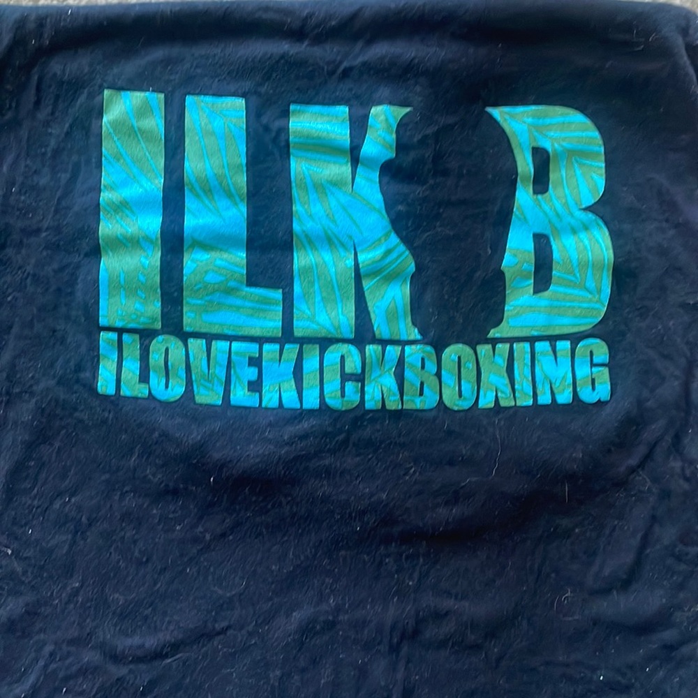 I love kickboxing, small, black tank top. Glove logo (palm tree theme).